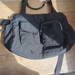 Kipling black travel bag two side compartmens please see all pictures some stain